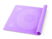 Load image into Gallery viewer, Purple silicone baking mat with measuring guidelines and rolled corner, ideal for pastry preparation.