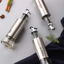 تحميل الصورة في عارض المعرض، Stainless steel oil and vinegar dispenser set with glass bodies, featuring non-drip spouts for easy pouring.