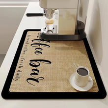Load image into Gallery viewer, Coffee bar mat with a coffee machine and cup on a kitchen counter