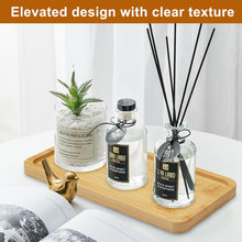 تحميل الصورة في عارض المعرض، Three Z. Labo diffusers on a wooden tray with a plant and magazine in the background.