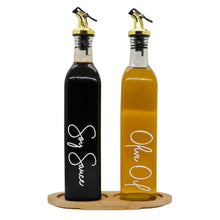 تحميل الصورة في عارض المعرض، Two oil and vinegar bottles with wooden stand on a white background