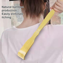 Load image into Gallery viewer, Person holding a long yellow strip of natural bamboo with text about its benefits.