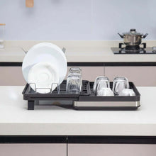 تحميل الصورة في عارض المعرض، Dish drying rack with dishes on a kitchen counter