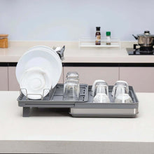 تحميل الصورة في عارض المعرض، Dish drying rack with dishes on a kitchen counter