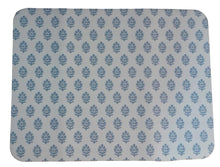 Load image into Gallery viewer, A rectangular mouse pad with rounded corners, featuring a repeating blue floral or leaf-like pattern on a white background, placed on a wooden desk.