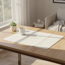 Load image into Gallery viewer, A white rectangular mouse pad with rounded corners, featuring a delicate gold floral design and elegant cursive text, displayed on a wooden desk.