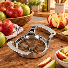 تحميل الصورة في عارض المعرض، Metallic apple slicer with sliced apples on a white background