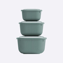 تحميل الصورة في عارض المعرض، Set of three green ribbed storage containers stacked on a white background