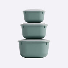 Load image into Gallery viewer, Set of three green food storage containers with lids on a white background