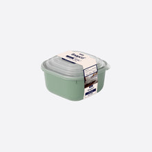 تحميل الصورة في عارض المعرض، Green food storage container with a clear lid on a white background