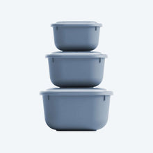 Load image into Gallery viewer, Set of three gray storage containers stacked on a white background