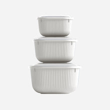 تحميل الصورة في عارض المعرض، Set of three white ribbed storage containers stacked on a white background