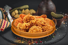تحميل الصورة في عارض المعرض، Fried chicken on a yellow plate with a dark background