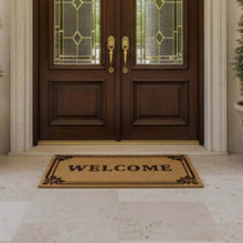 Load image into Gallery viewer, Brown doormat with 'WELCOME' text in front of a wooden door with glass panels.