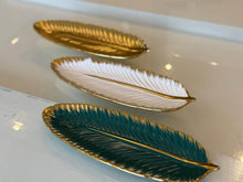 تحميل الصورة في عارض المعرض، Decorative leaf-shaped plates with gold edges on a light background