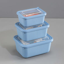 تحميل الصورة في عارض المعرض، Set of three blue rectangular food containers with lids on a gray background