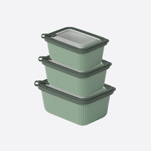 تحميل الصورة في عارض المعرض، Set of three green food storage containers with lids on a white background