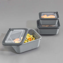 Load image into Gallery viewer, Set of three gray food storage containers with clear lids on a gray background