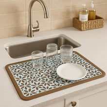 Load image into Gallery viewer, Patterned cutting board with glasses and a plate on a kitchen counter