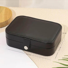 Load image into Gallery viewer, Leather portable travel jewelry box with multi-layer storage for earrings, necklaces, and rings.