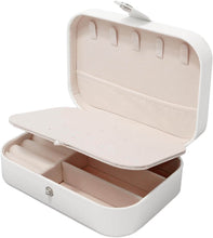 Load image into Gallery viewer, White leather portable travel jewelry box with multiple storage compartments for earrings, necklaces, and rings.