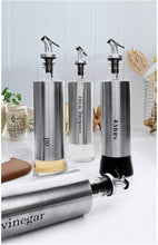 Load image into Gallery viewer, Stainless steel oil and vinegar dispensers with sleek design, showcasing labels for oil, cooking wine, and sauce.
