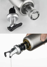 تحميل الصورة في عارض المعرض، Glass control pot with stainless steel lid and pouring spout for oil and vinegar, featuring a non-drip design.