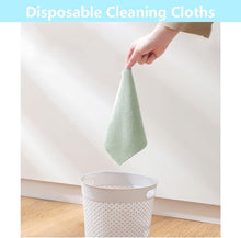 Load image into Gallery viewer, Hand holding a disposable cleaning cloth over a trash bin, demonstrating convenient waste disposal.