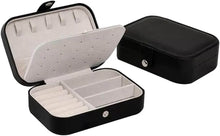 Load image into Gallery viewer, Leather portable travel jewelry box with multi-layer storage for earrings, necklaces, and rings.