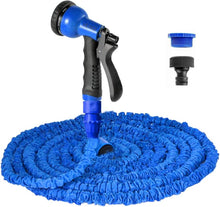 Load image into Gallery viewer, Blue expandable garden hose with 8-pattern spray nozzle and connectors coiled neatly.
