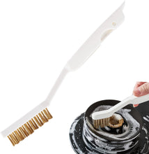 Load image into Gallery viewer, Cleaning brush with bristles being used on a soapy dish.