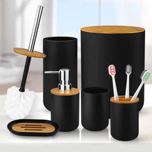 تحميل الصورة في عارض المعرض، Bathroom accessories set with black containers and wooden accents on a white surface.