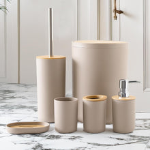 تحميل الصورة في عارض المعرض، Beige bathroom accessory set on a marble surface with a neutral background
