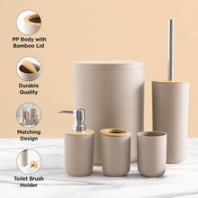 تحميل الصورة في عارض المعرض، Beige bathroom accessory set with matching design on a beige background