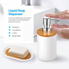 تحميل الصورة في عارض المعرض، Liquid soap dispenser with wooden top and base, being used by a hand.