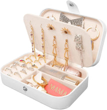 Load image into Gallery viewer, Leather portable travel jewelry box open with earrings, rings, and necklace securely stored in compartments.
