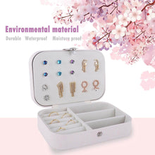 Load image into Gallery viewer, Leather portable travel jewelry box with earrings and rings, featuring environmental, waterproof, and moisture-proof material.