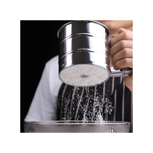 Load image into Gallery viewer, Manual stainless steel sieve pouring sugar into a bowl, ideal for bakers and cooking enthusiasts.