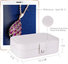 Load image into Gallery viewer, Leather portable travel jewelry box showcased next to an iPad, featuring dimensions and a sparkling necklace.