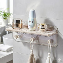 تحميل الصورة في عارض المعرض، A wall-mounted clear acrylic bathroom tooth holder and organizer tray with hooks, shown holding toiletries and towels in a bright bathroom setting.