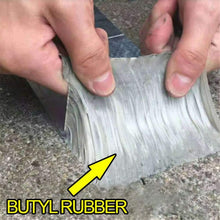 Load image into Gallery viewer, Butyl rubber being held by hands with a yellow arrow pointing to it on a concrete surface.