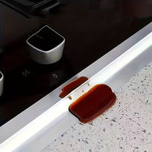 Load image into Gallery viewer, Car cup holder with a small container of brown liquid on a car dashboard.