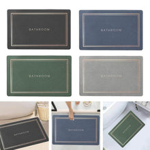 Load image into Gallery viewer, Set of four bath mats in different colors with 'Bathroom' text, shown on a white background.