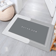 Load image into Gallery viewer, Gray doormat with 'Bathroom' text on a wooden floor