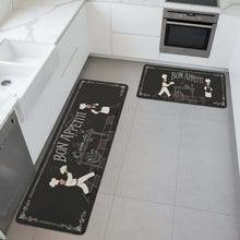 تحميل الصورة في عارض المعرض، Two 'Bon Appétit' themed kitchen mats on a tiled floor.
