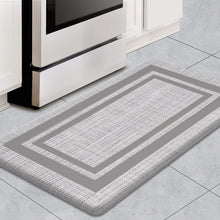 تحميل الصورة في عارض المعرض، Gray and white patterned rug on a tiled floor next to a white appliance.