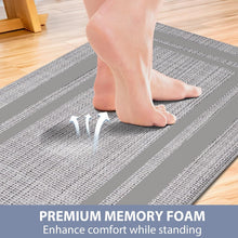 تحميل الصورة في عارض المعرض، Person standing on a gray striped mat with text about premium memory foam.