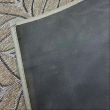 تحميل الصورة في عارض المعرض، Gray rug with textured pattern on a carpeted floor, featuring the Socon brand logo.