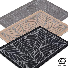 تحميل الصورة في عارض المعرض، Three leaf-patterned doormats in gray, beige, and black with a Soconex logo.