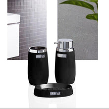 Load image into Gallery viewer, A set of two black ribbed bathroom containers with silver lids, displayed in front of a bathroom scene background featuring gray tiles, a white shelf, and a green plant.